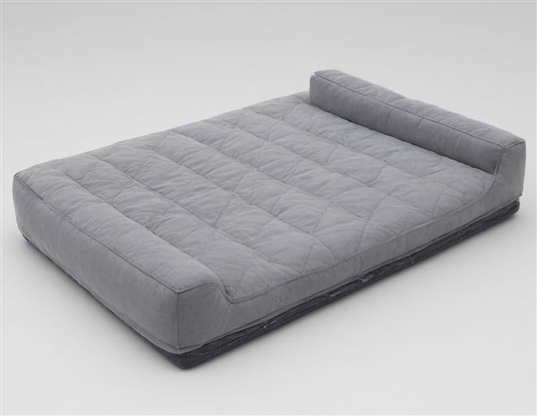 AI-generated illustration of a grey sofa-style waterproof orthopedic dog bed matching the Bedsure style