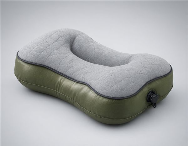 AI-generated illustration of a contoured foam-layered inflatable camping pillow matching the NEMO Fillo Elite style