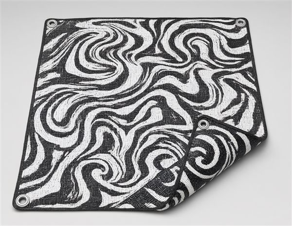 AI-generated illustration of a reversible black and white swirl woven camping mat matching the Stylish Camping style